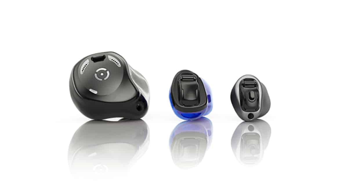 The three hearing aids in the Phonak Virto Infinio line (l to r): The Virto R rechargeable wireless in-the-ear (ITE), the battery-powered non-wireless completely in-canal (CIC), and titanium invisible-in-canal (IIC).