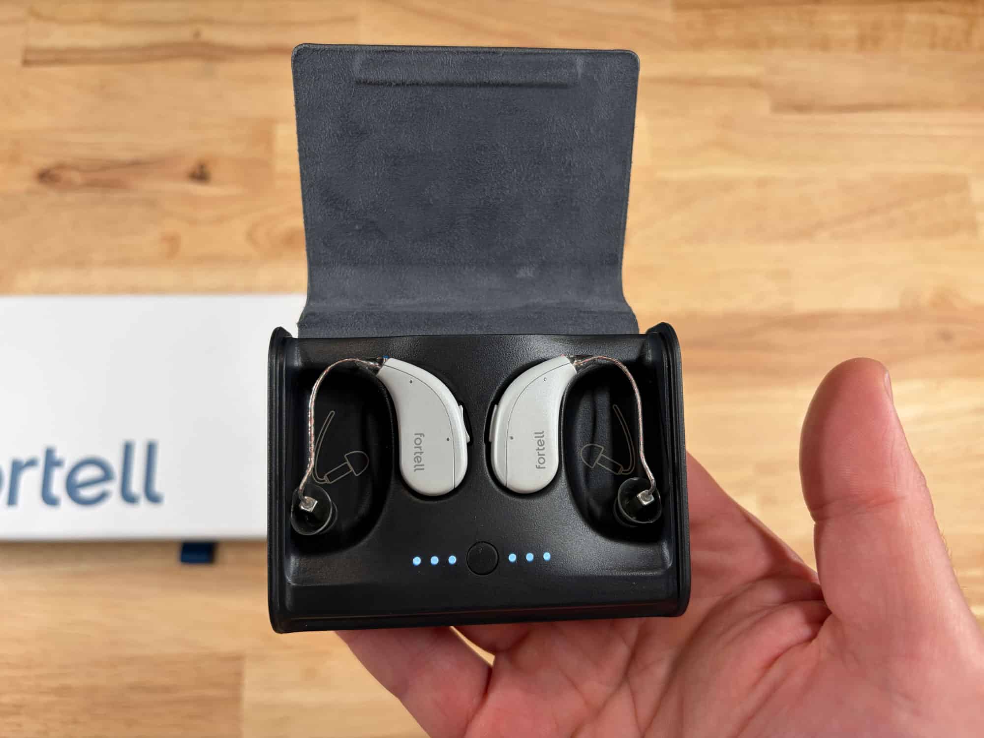 Fortell hearing aids in their charger.